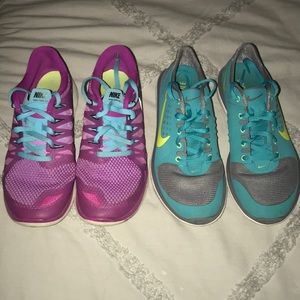 Two pairs of Nike running shoes